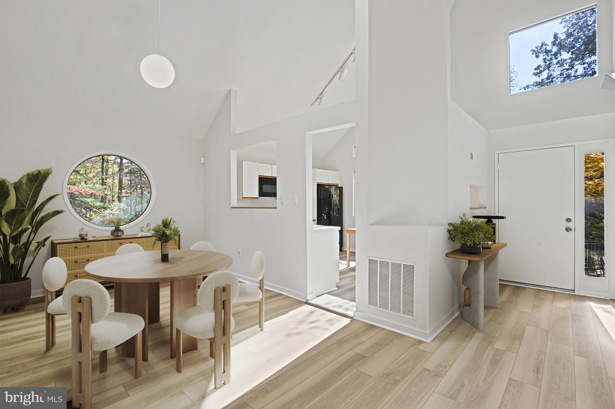 11504 Turnbridge Lane Reston, VA 20194 - Photo 4 of 51 a view of a dining room with furniture and wooden floor