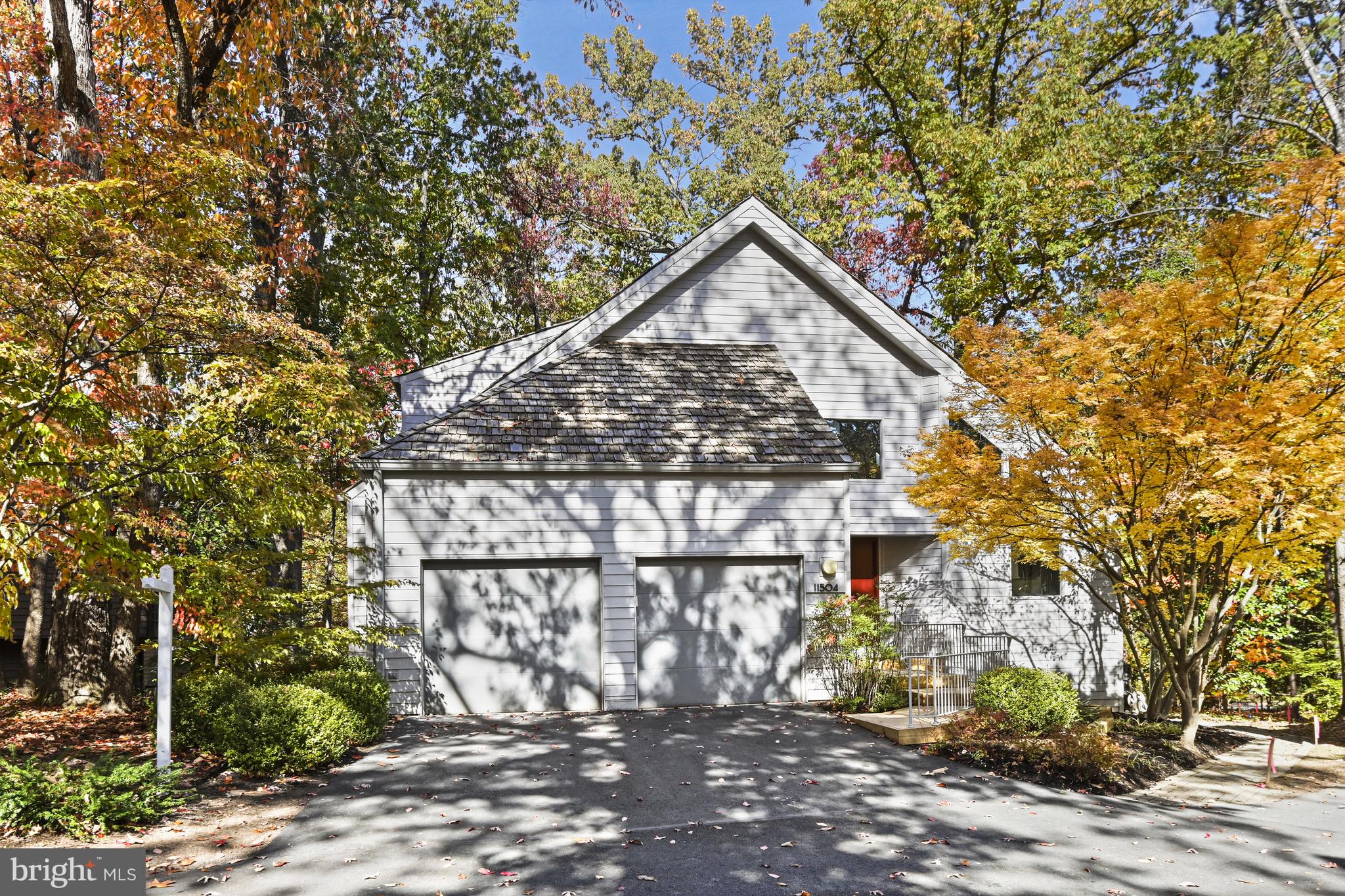 11504 Turnbridge Lane Reston, VA 20194 - Photo 50 of 51 a view of a brick house with a large windows