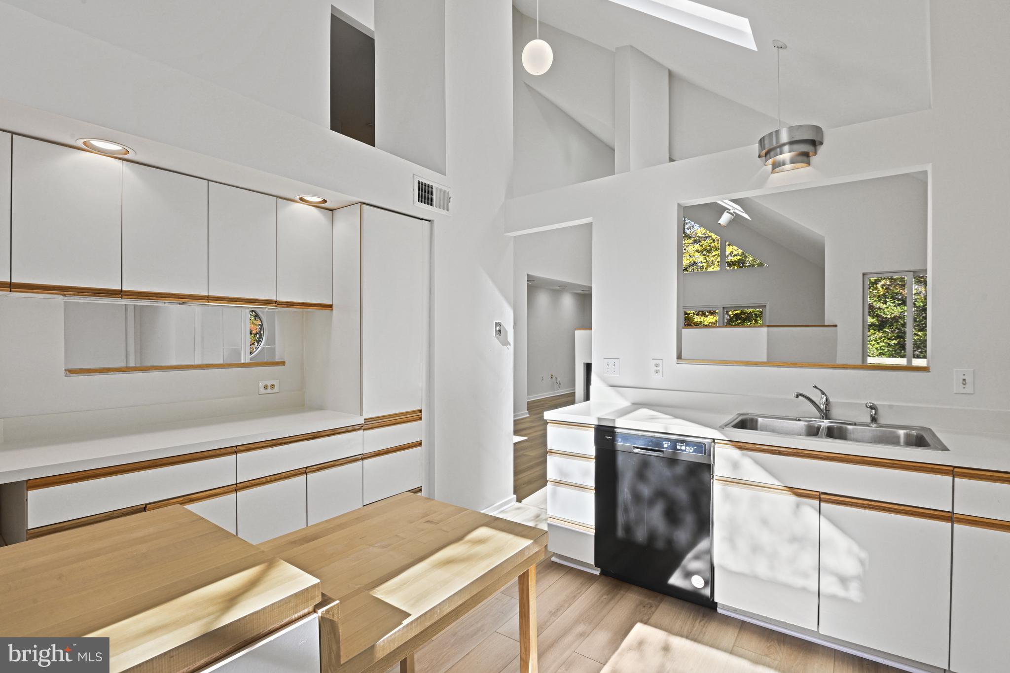 11504 Turnbridge Lane Reston, VA 20194 - Photo 10 of 51 a kitchen with a sink appliances and cabinets