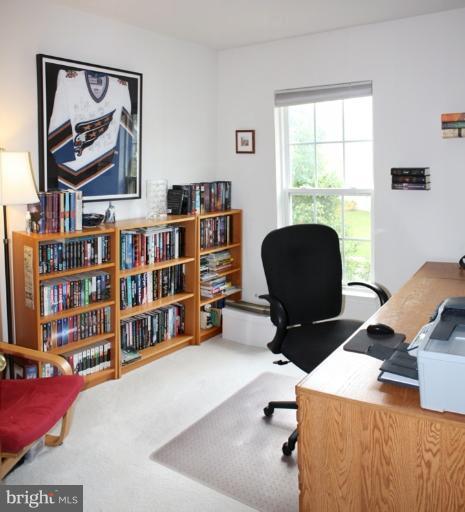 3742 Hope Commons Circle Frederick, MD 21704 - Photo 3 of 17 a workspace with a bookshelf and a window
