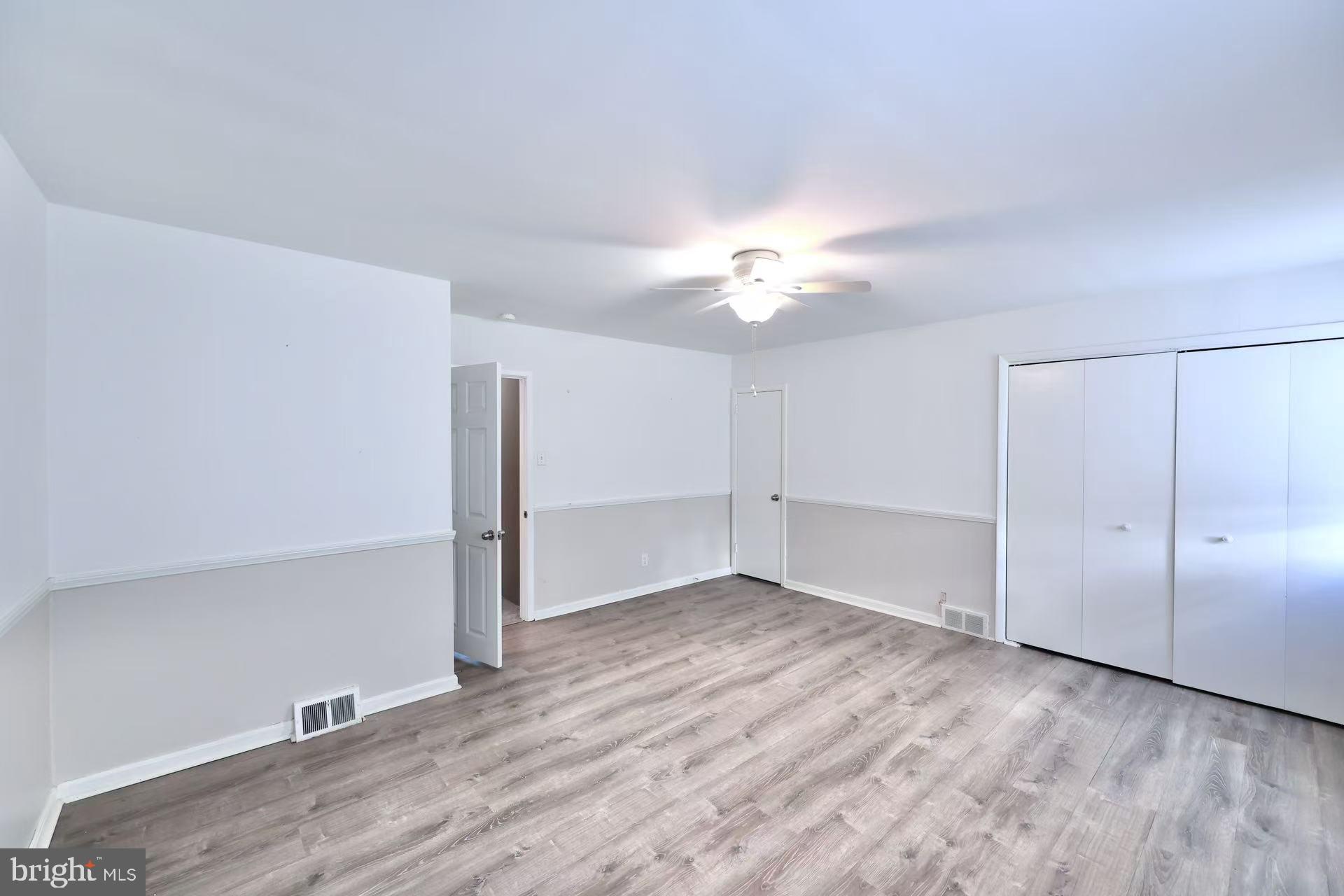 11850 Basile Road Philadelphia, PA 19154 - Photo 18 of 31 a view of an empty room with wooden floor