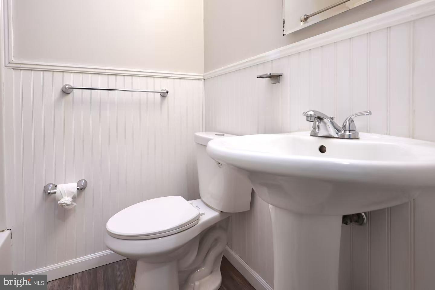 11850 Basile Road Philadelphia, PA 19154 - Photo 20 of 31 a bathroom with a sink a mirror and a toilet
