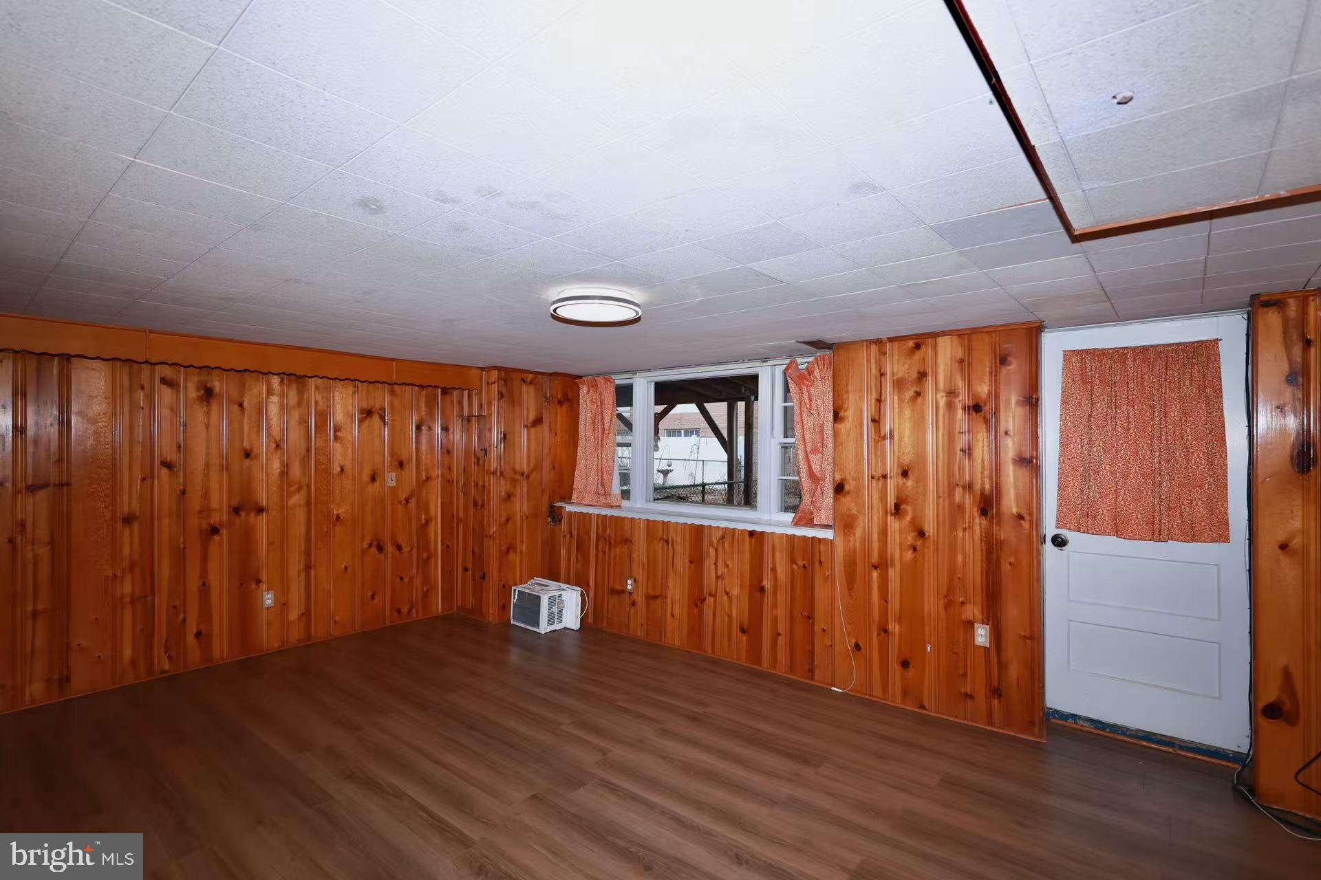11850 Basile Road Philadelphia, PA 19154 - Photo 28 of 31 a view of an empty room with wooden floor and a window