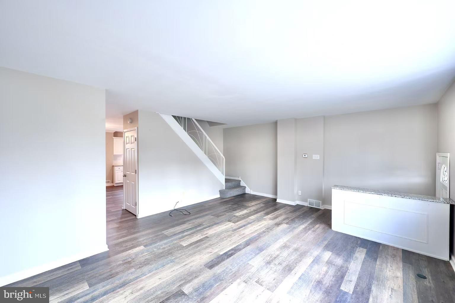 11850 Basile Road Philadelphia, PA 19154 - Photo 4 of 31 a view of an empty room with wooden floor and a window
