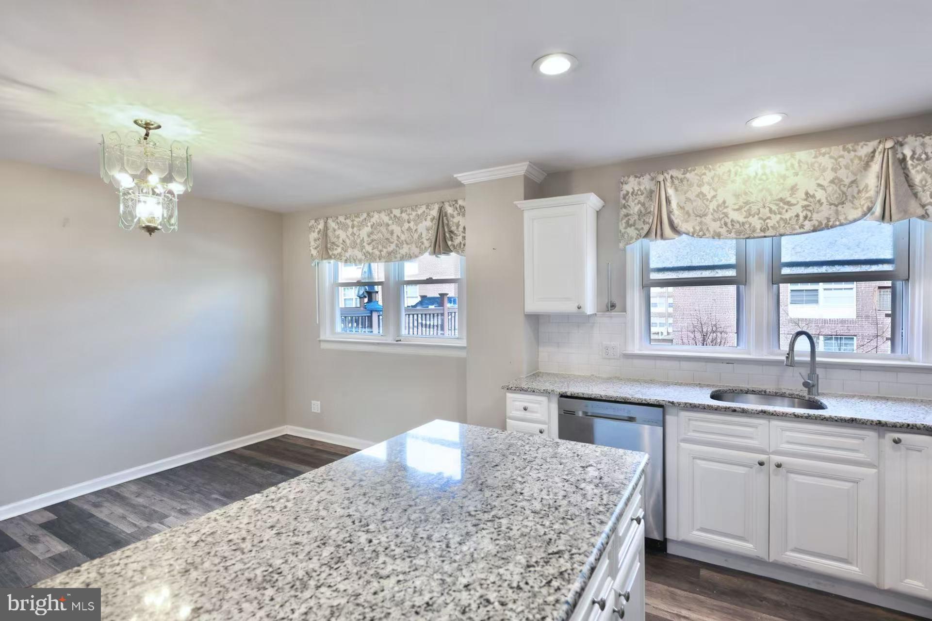 11850 Basile Road Philadelphia, PA 19154 - Photo 6 of 31 a kitchen with a sink granite counter tops and a window