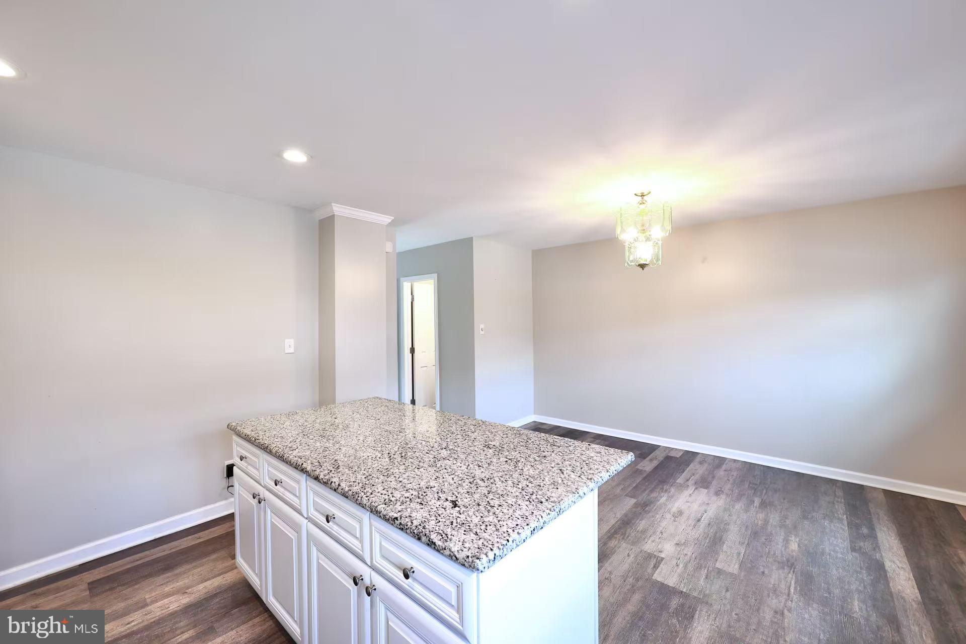 11850 Basile Road Philadelphia, PA 19154 - Photo 7 of 31 a bathroom with a granite countertop sink and a mirror
