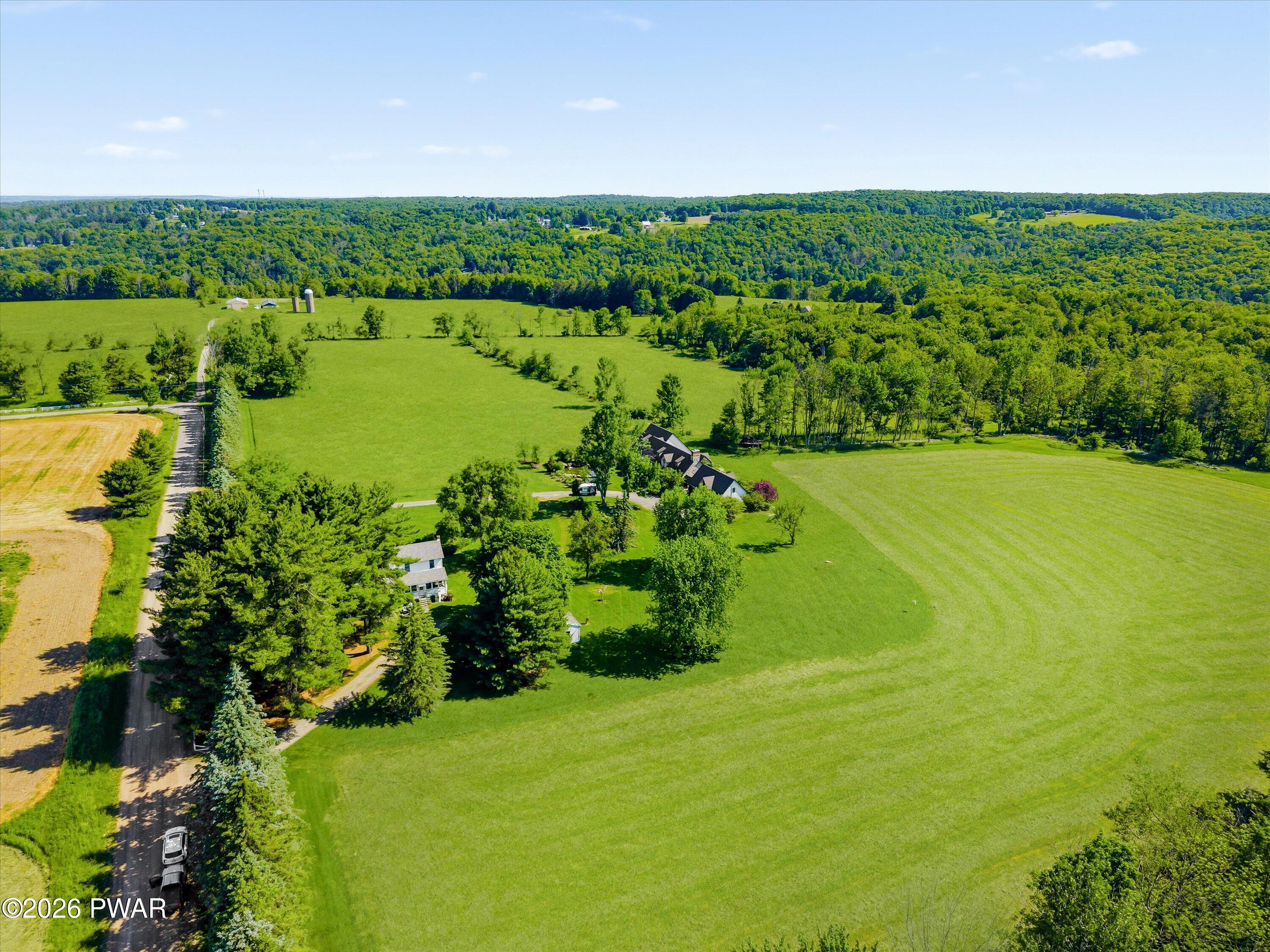 127 Valleyview Road Greentown, PA 18426 - Photo 62 of 66 a view of a lake with a big yard