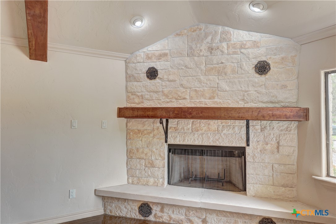 210 Center Point Drive Center Point, TX 78010 - Photo 15 of 44 Primary bedroom w/fireplace