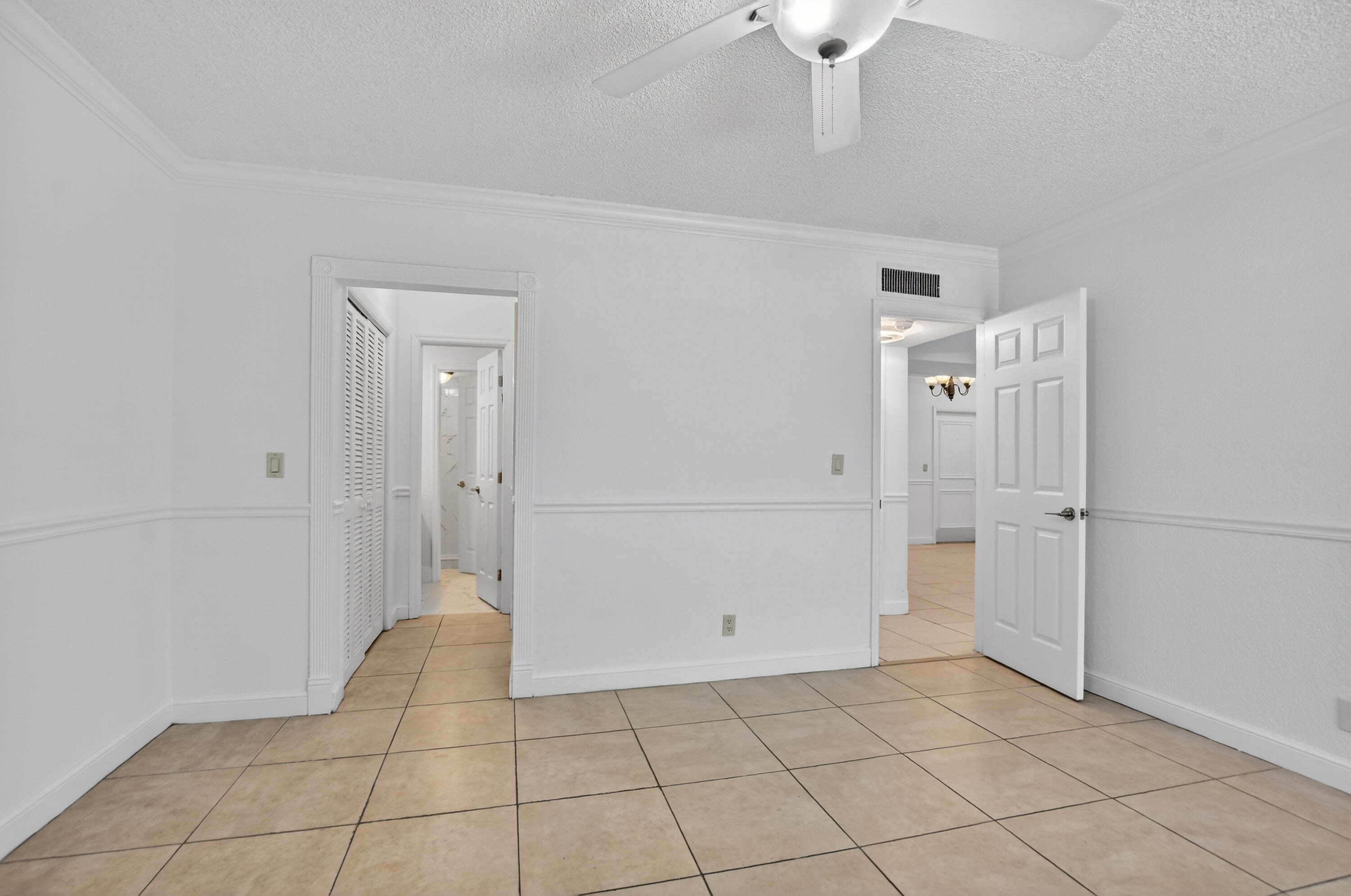 636 Northwest 13th Street, Unit 110 Boca Raton, FL 33486 - Photo 23 of 35 a view of a livingroom with an empty space