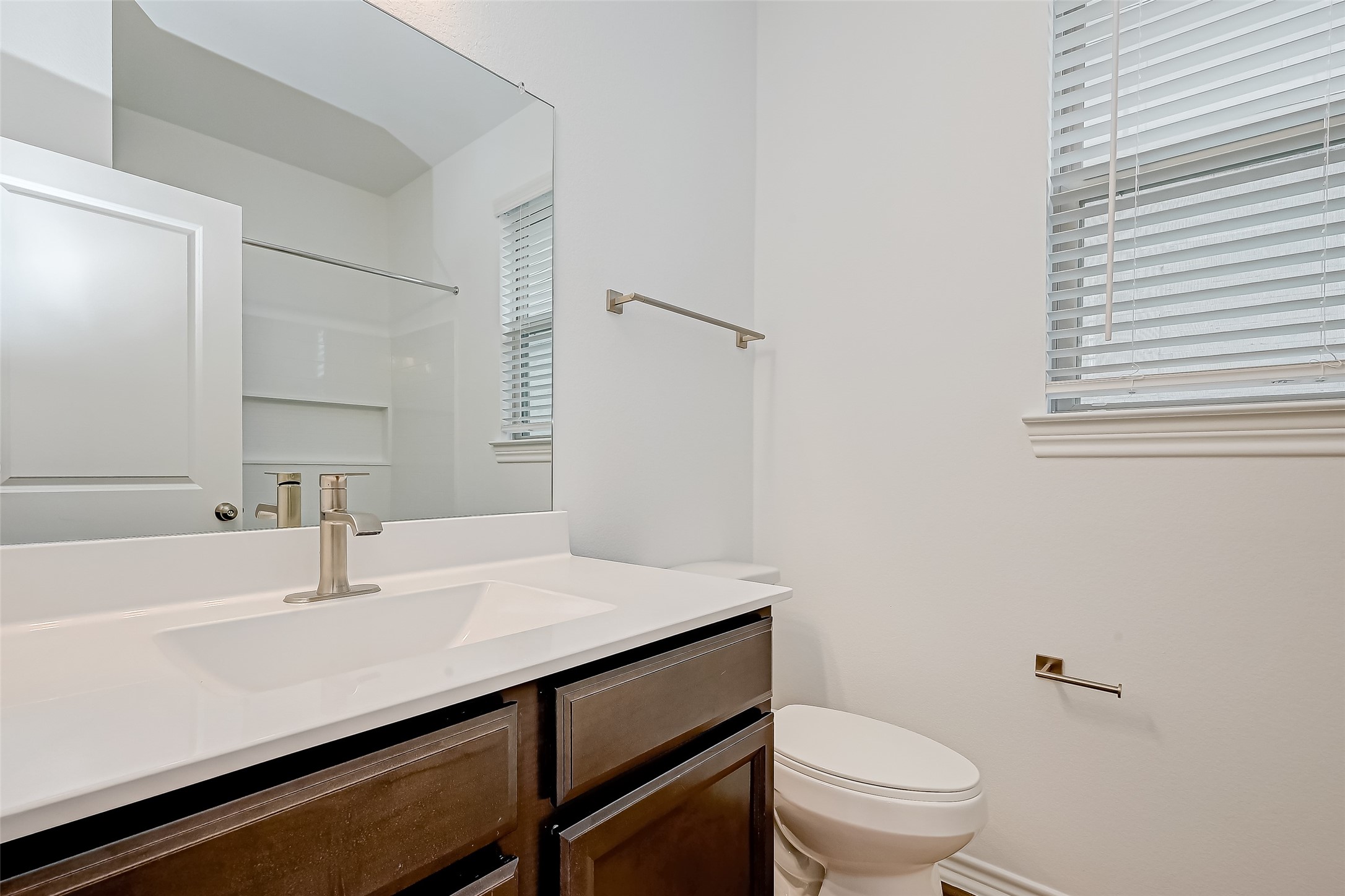 1308 Tan Gable Lane Katy, TX 77493 - Photo 17 of 30 a bathroom with a sink a toilet and shower
