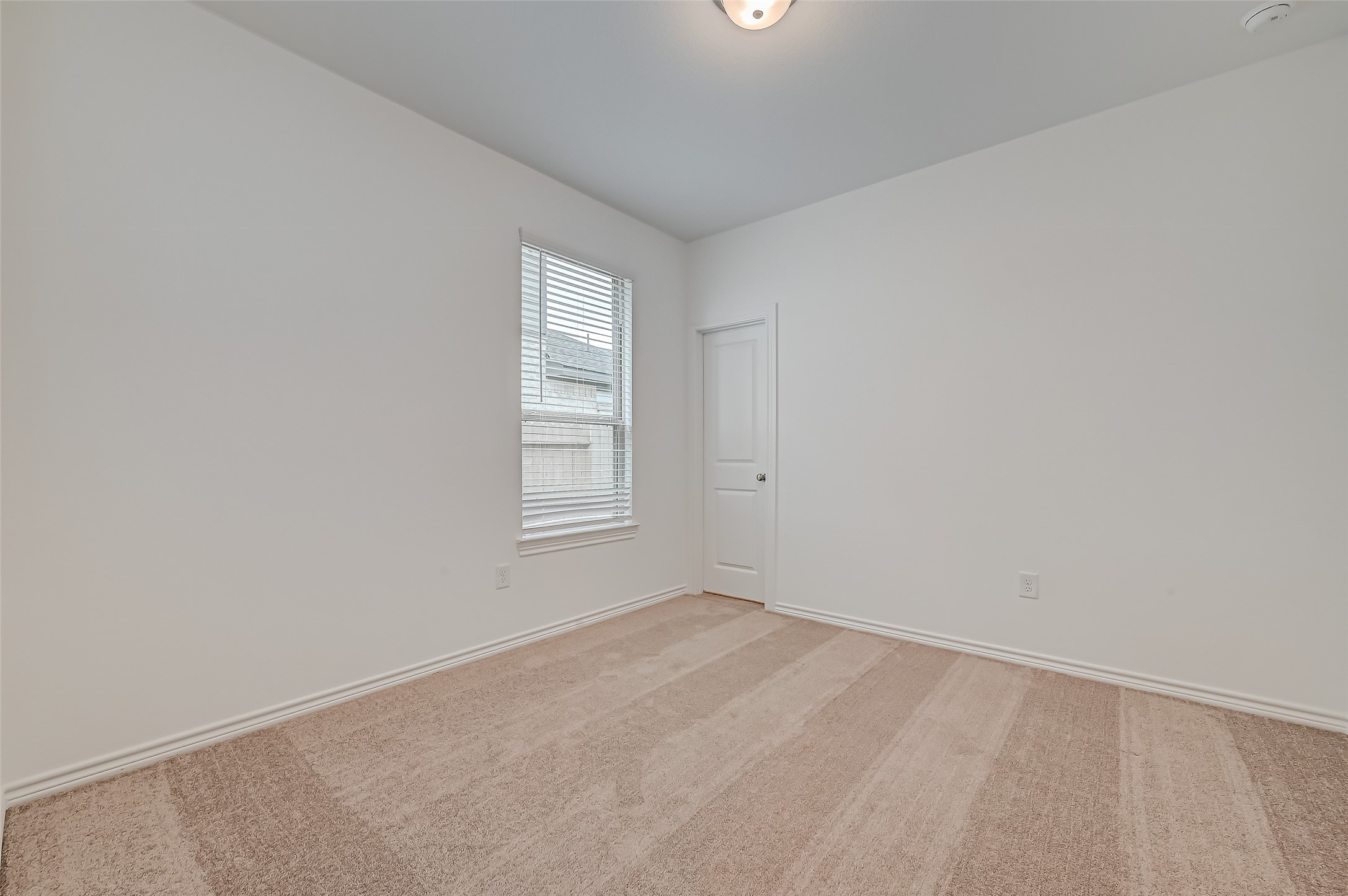 1308 Tan Gable Lane Katy, TX 77493 - Photo 19 of 30 an empty room with windows