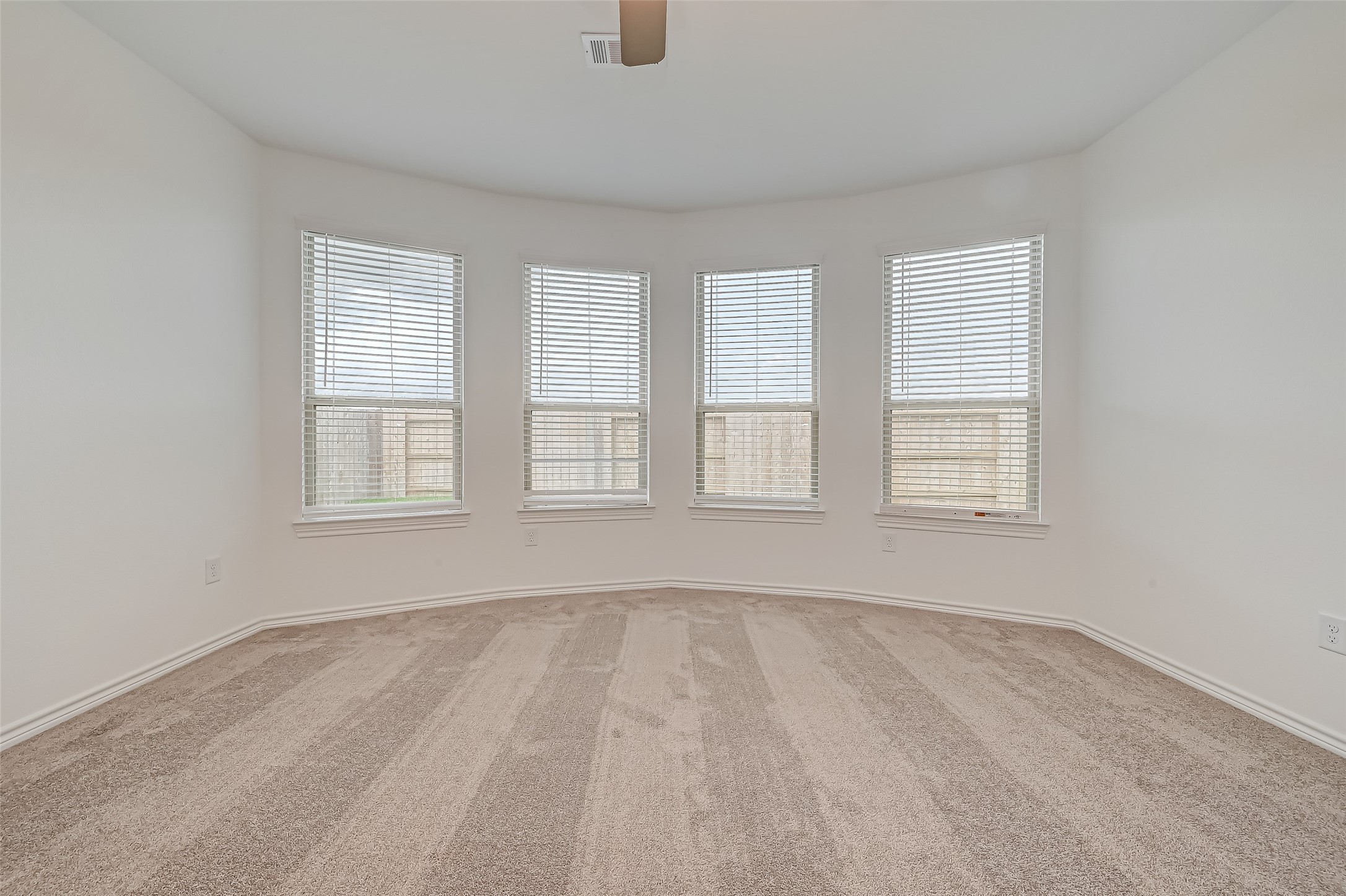 1308 Tan Gable Lane Katy, TX 77493 - Photo 22 of 30 an empty room with windows