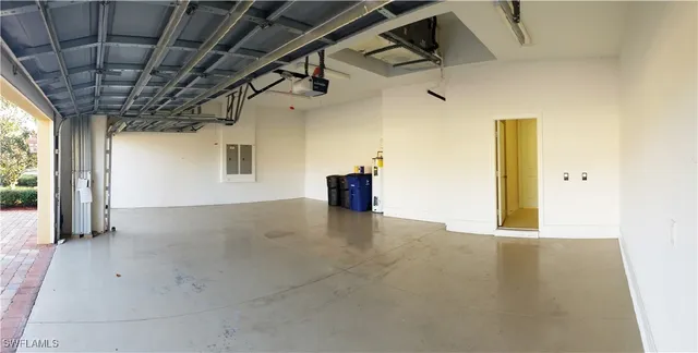 a view of a hallway with wooden walls