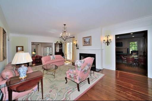 411 South County Line Road Hinsdale, IL 60521 - Photo 4 of 16 a living room with furniture and a fireplace