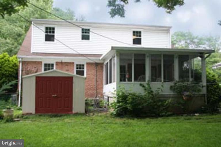 4119 Raleigh Road Pikesville, MD 21208 - Photo 15 of 15 front view of a house with a yard