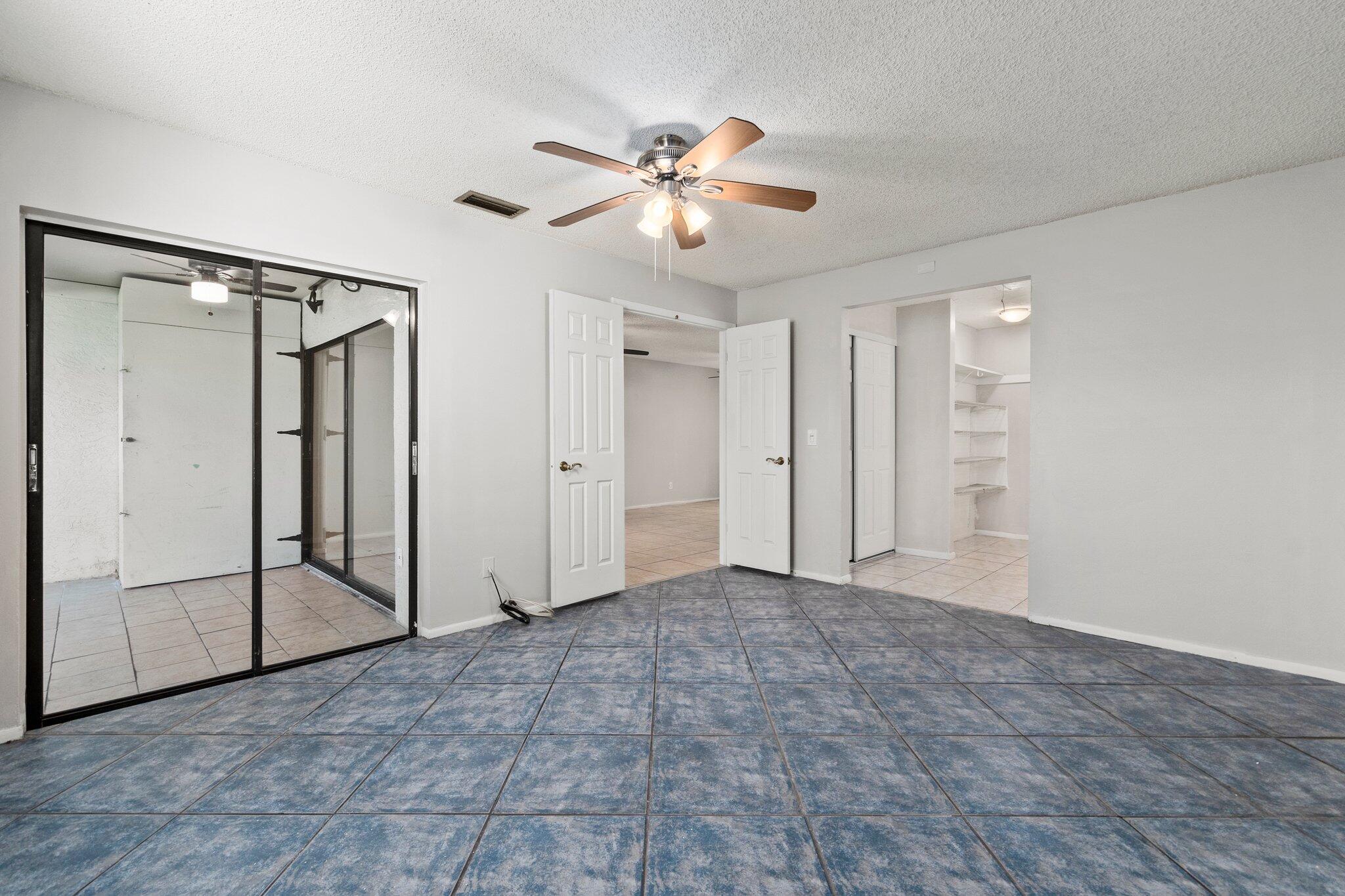 6012 Indrio Road, Unit E2 Fort Pierce, FL 34951 - Photo 14 of 25 a view of an empty room