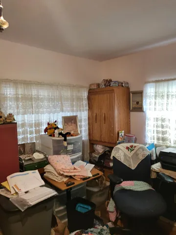 a room with gym equipment and a large window