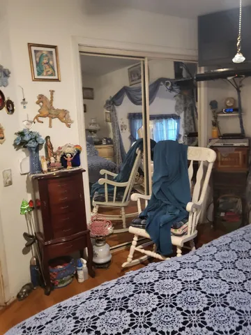 a kitchen with a sink a stove and cabinets