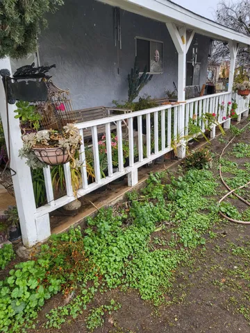 a view of a porch with furniture