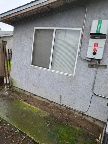 a view of table and chair in the room