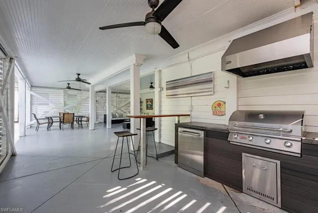 a kitchen with cabinets and appliances