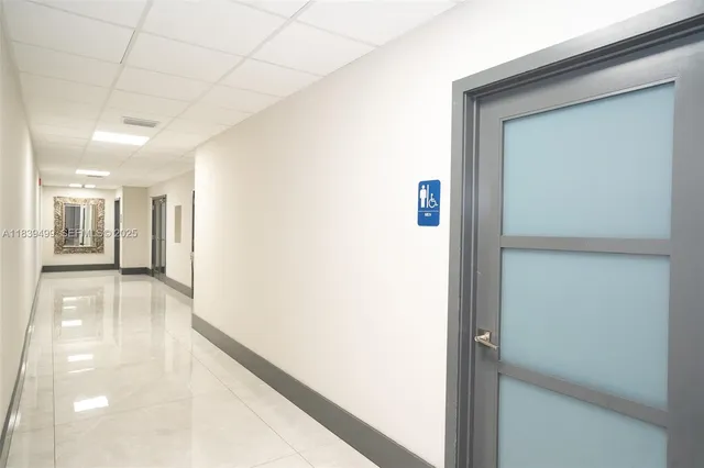 a spacious bathroom with a tub and shower