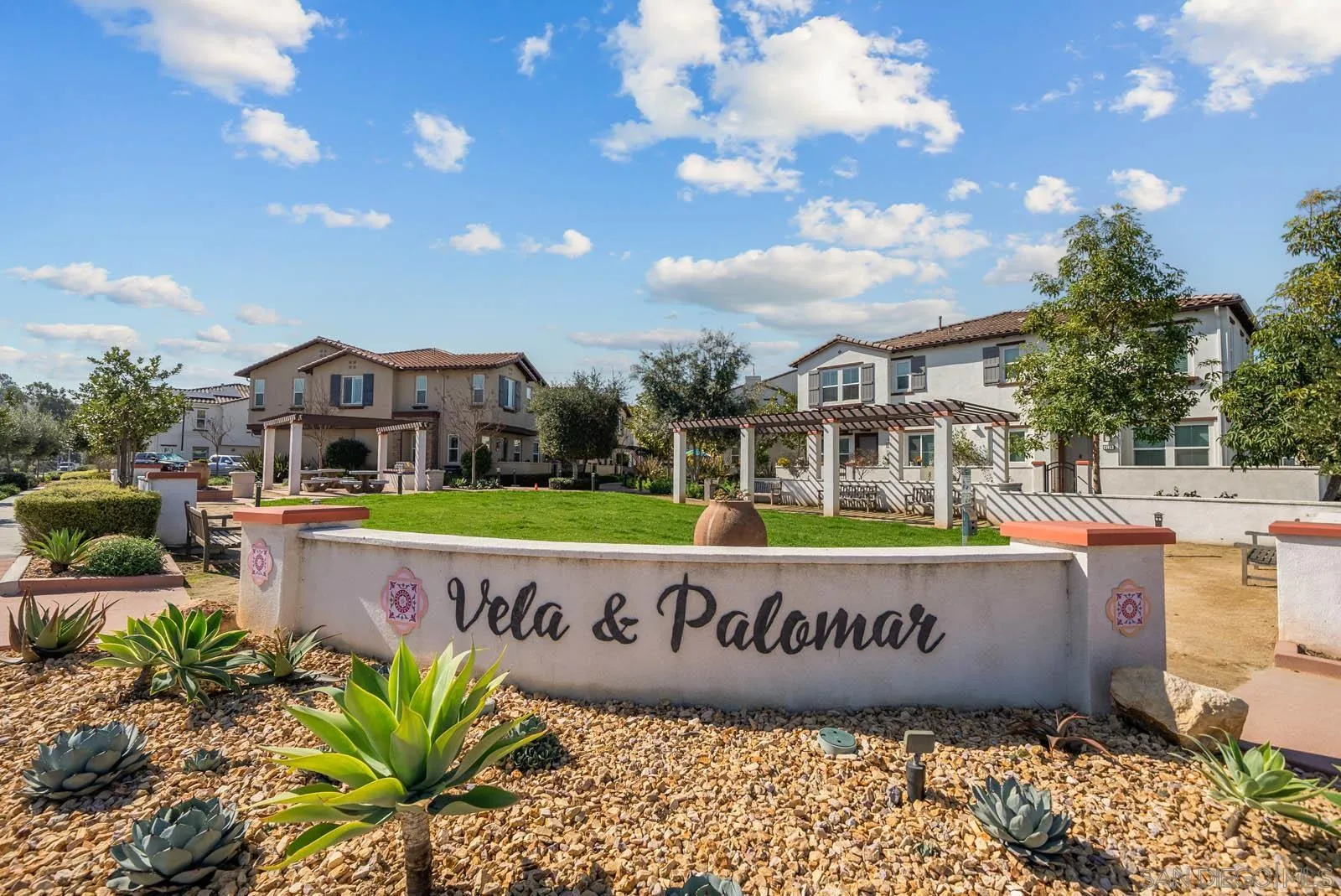 4132 Rio Azul Way Oceanside, CA 92057 - Photo 1 of 48 a sign that is parked in front of a building