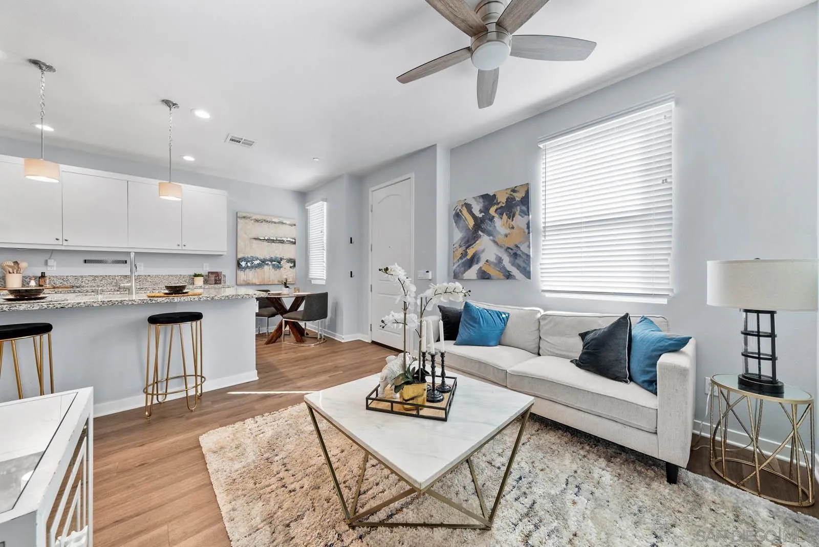 4132 Rio Azul Way Oceanside, CA 92057 - Photo 11 of 48 a living room with furniture and kitchen view