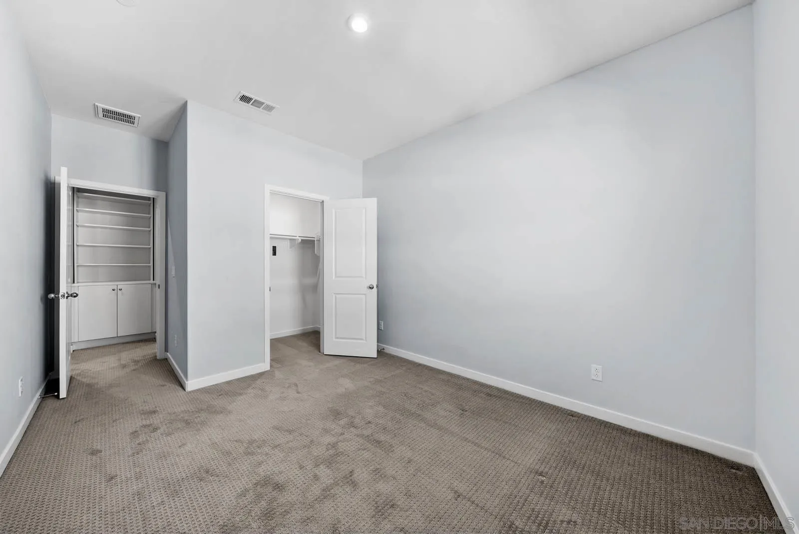 4132 Rio Azul Way Oceanside, CA 92057 - Photo 12 of 48 an empty room with closet area