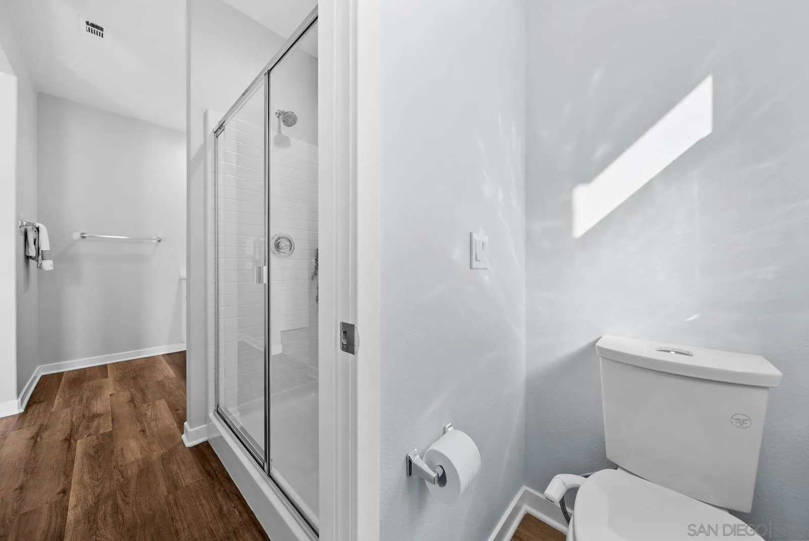 4132 Rio Azul Way Oceanside, CA 92057 - Photo 18 of 48 a bathroom with a toilet and shower