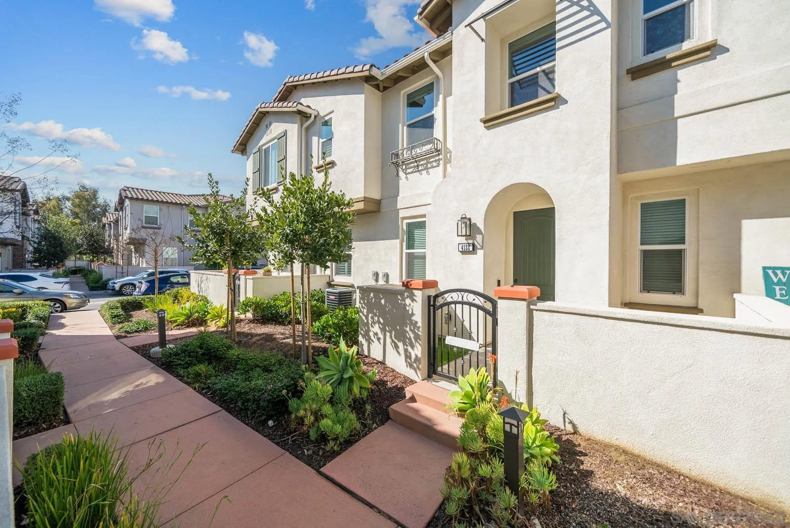 4132 Rio Azul Way Oceanside, CA 92057 - Photo 26 of 48 a front view of a house with a garden