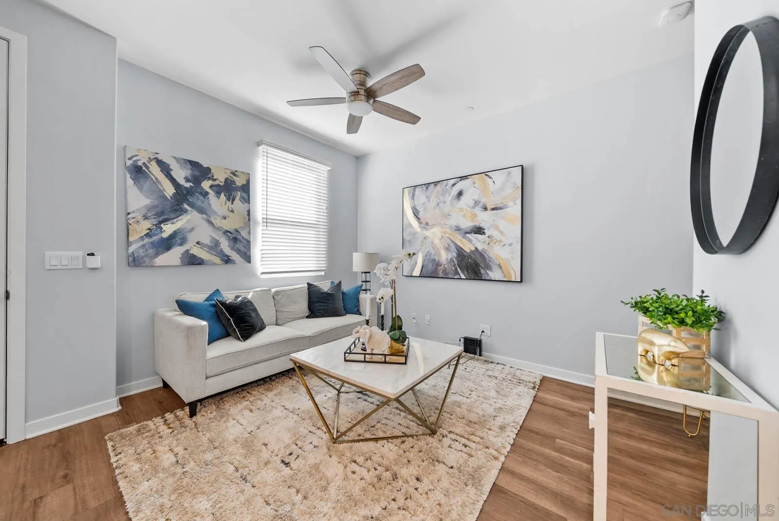 4132 Rio Azul Way Oceanside, CA 92057 - Photo 4 of 48 a living room with furniture and a potted plant