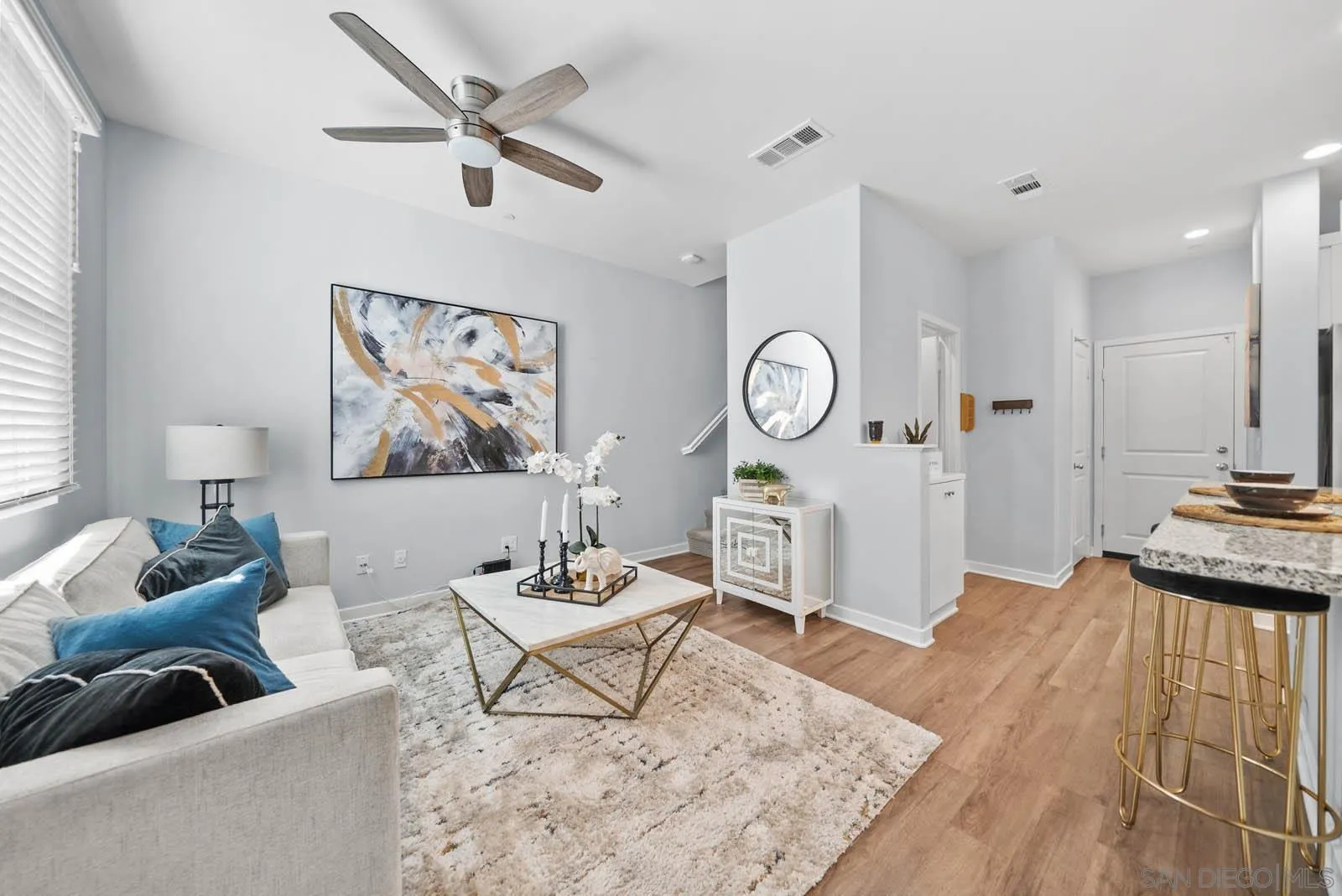 4132 Rio Azul Way Oceanside, CA 92057 - Photo 10 of 48 a living room with furniture and a rug
