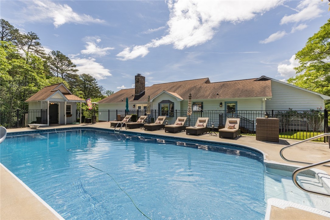 1335 Shingle Gap Road Purlear, NC 28665 - Photo 9 of 49 swimming pool view with a seating space