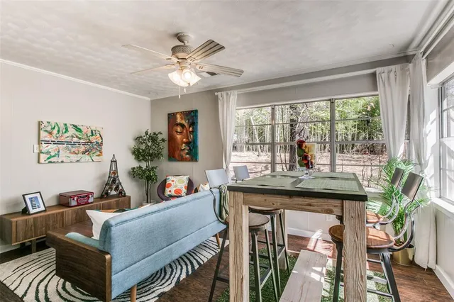 a bathroom with a sink and a curtain