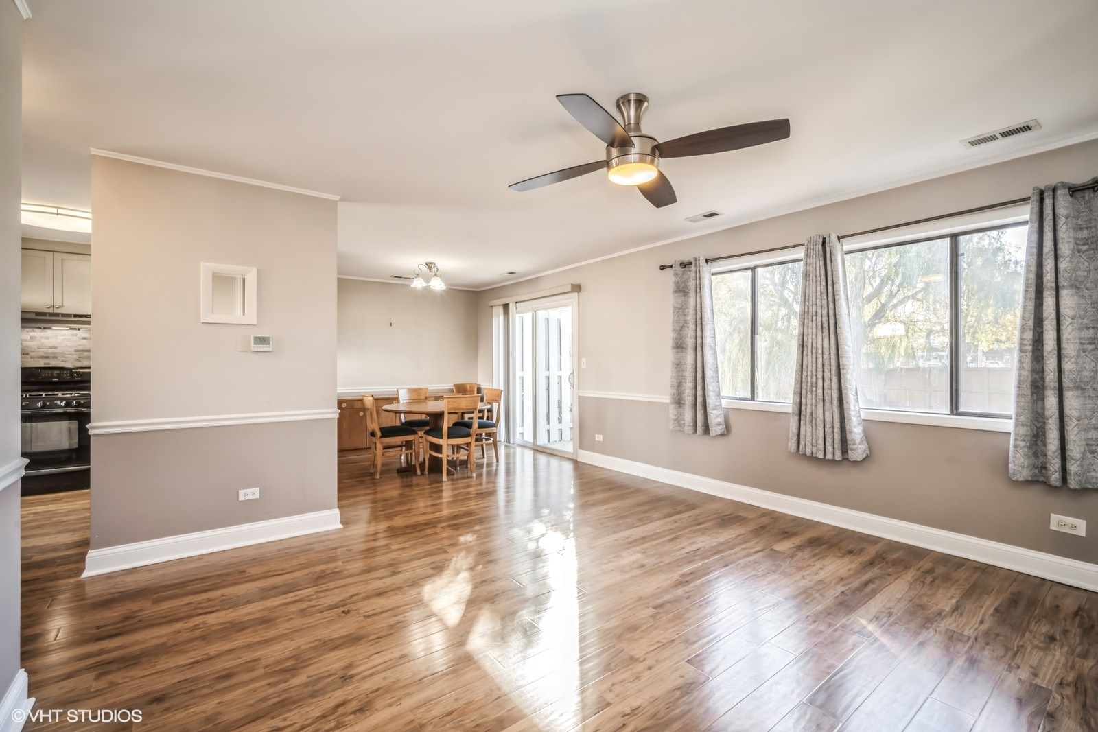 793 Barnaby Place Wheeling, IL 60090 - Photo 5 of 10 a view of empty room with wooden floor and window