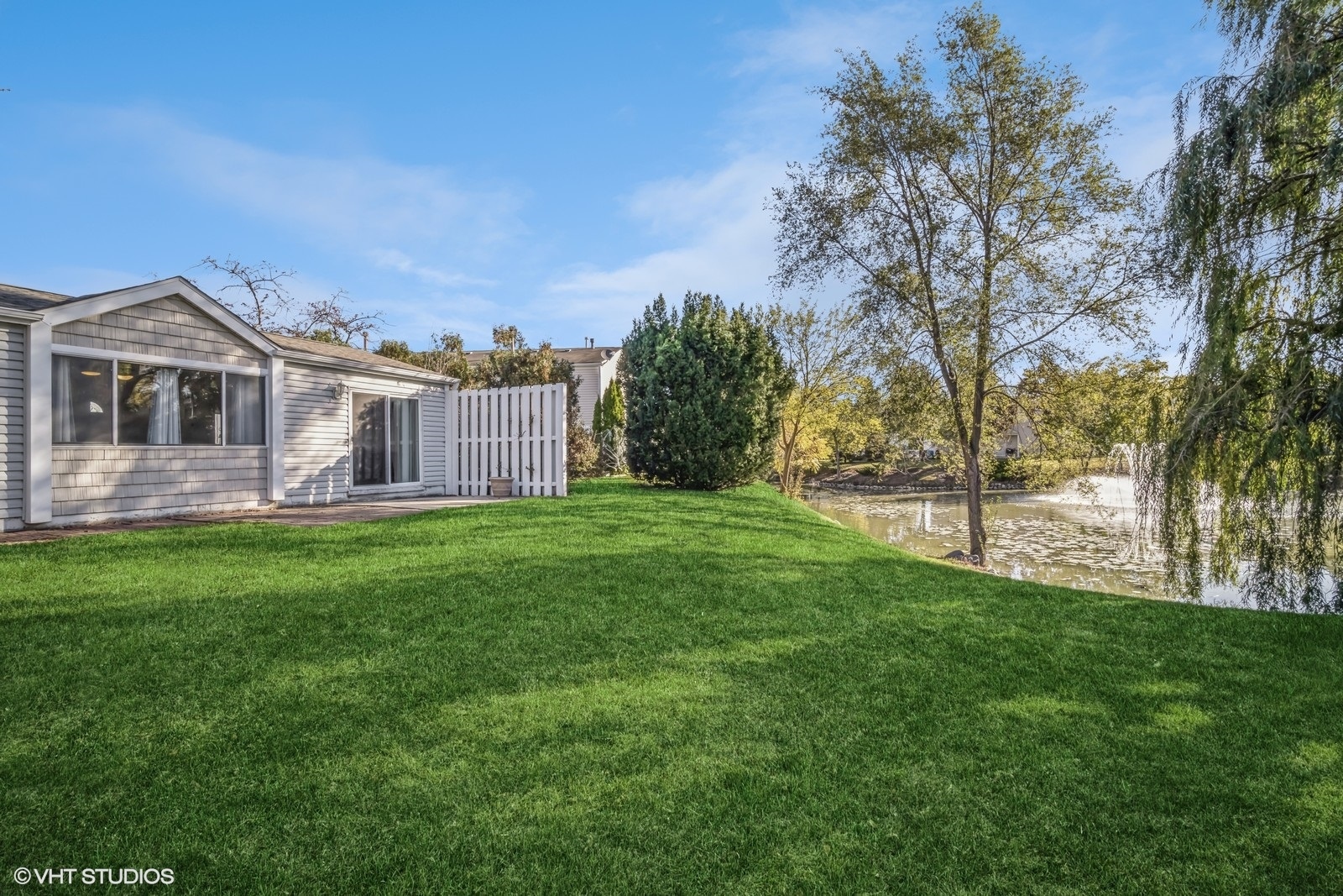 793 Barnaby Place Wheeling, IL 60090 - Photo 9 of 10 a front view of a house with yard and green space
