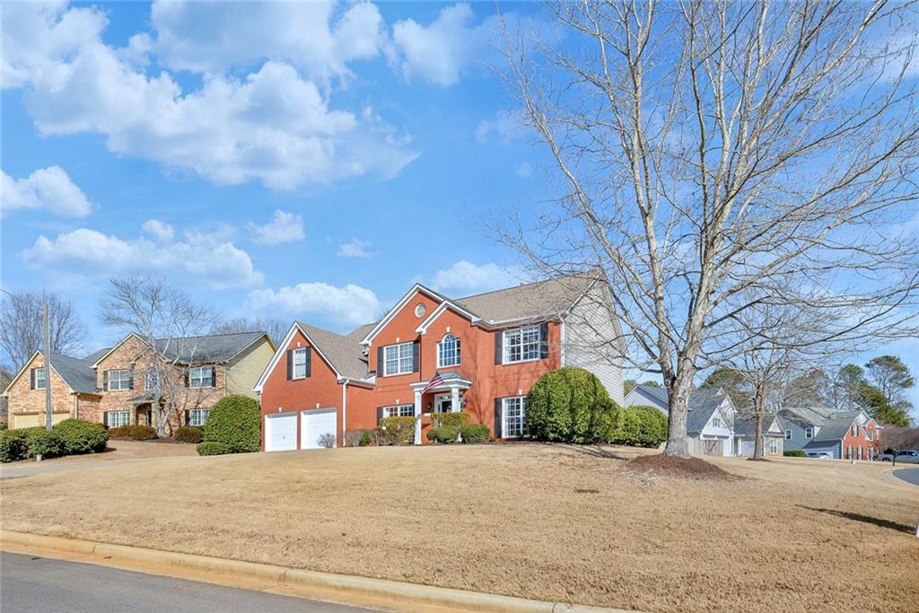 605 Garnet Court Canton, GA 30114 - Photo 4 of 75 front view of a house with a street