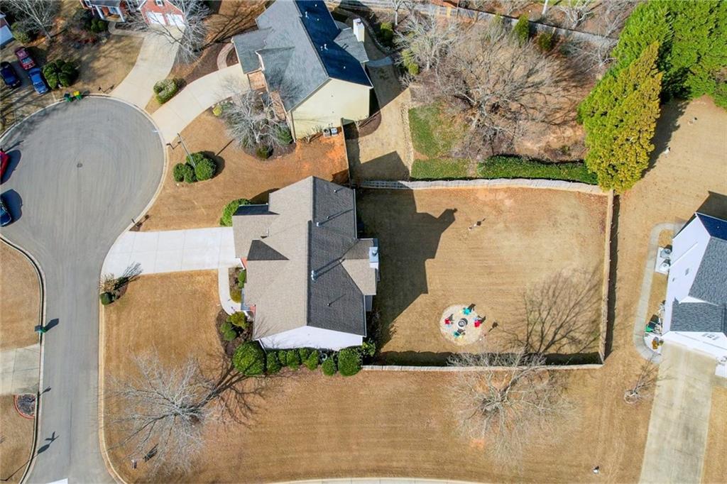 605 Garnet Court Canton, GA 30114 - Photo 56 of 75 an aerial view of a house with a yard