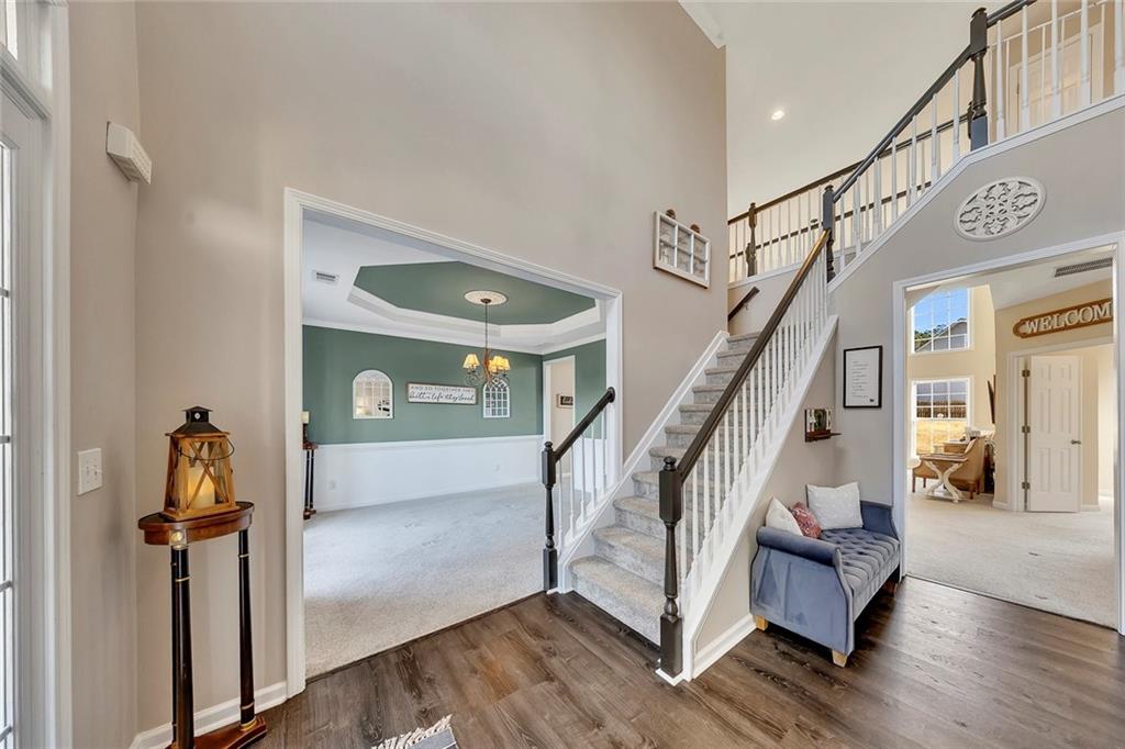 605 Garnet Court Canton, GA 30114 - Photo 7 of 75 a view of entryway and hall with wooden floor