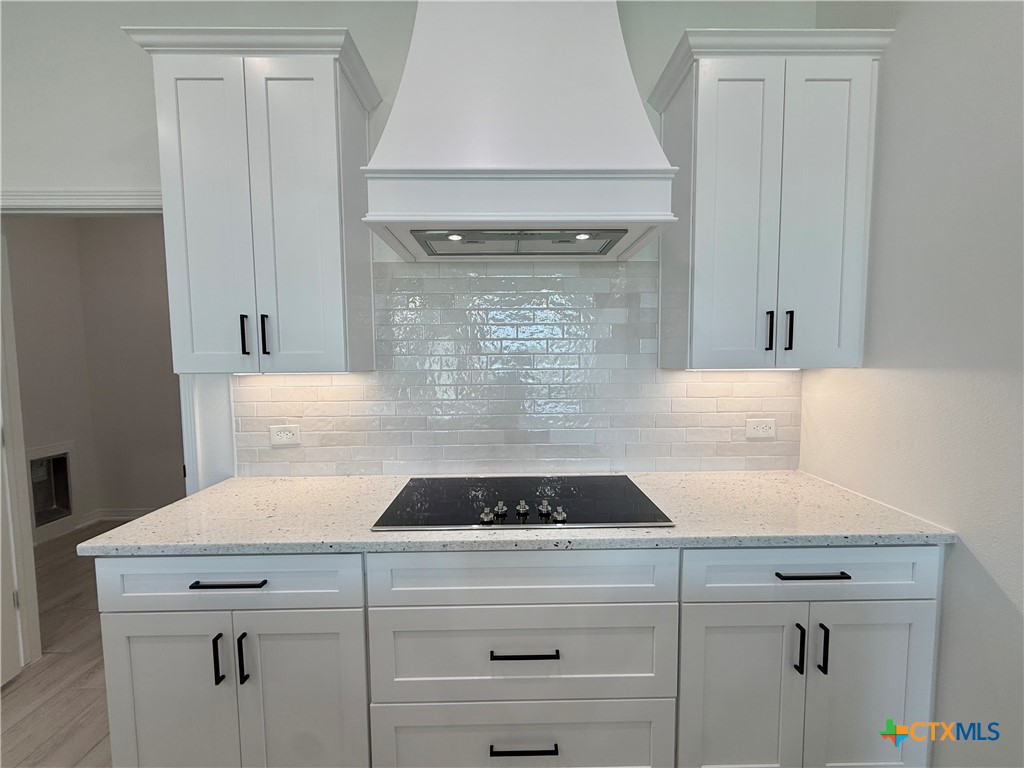 2016 Yarrow Road Temple, TX 76502 - Photo 8 of 30 a close view of a stove a sink and dishwasher in a kitchen