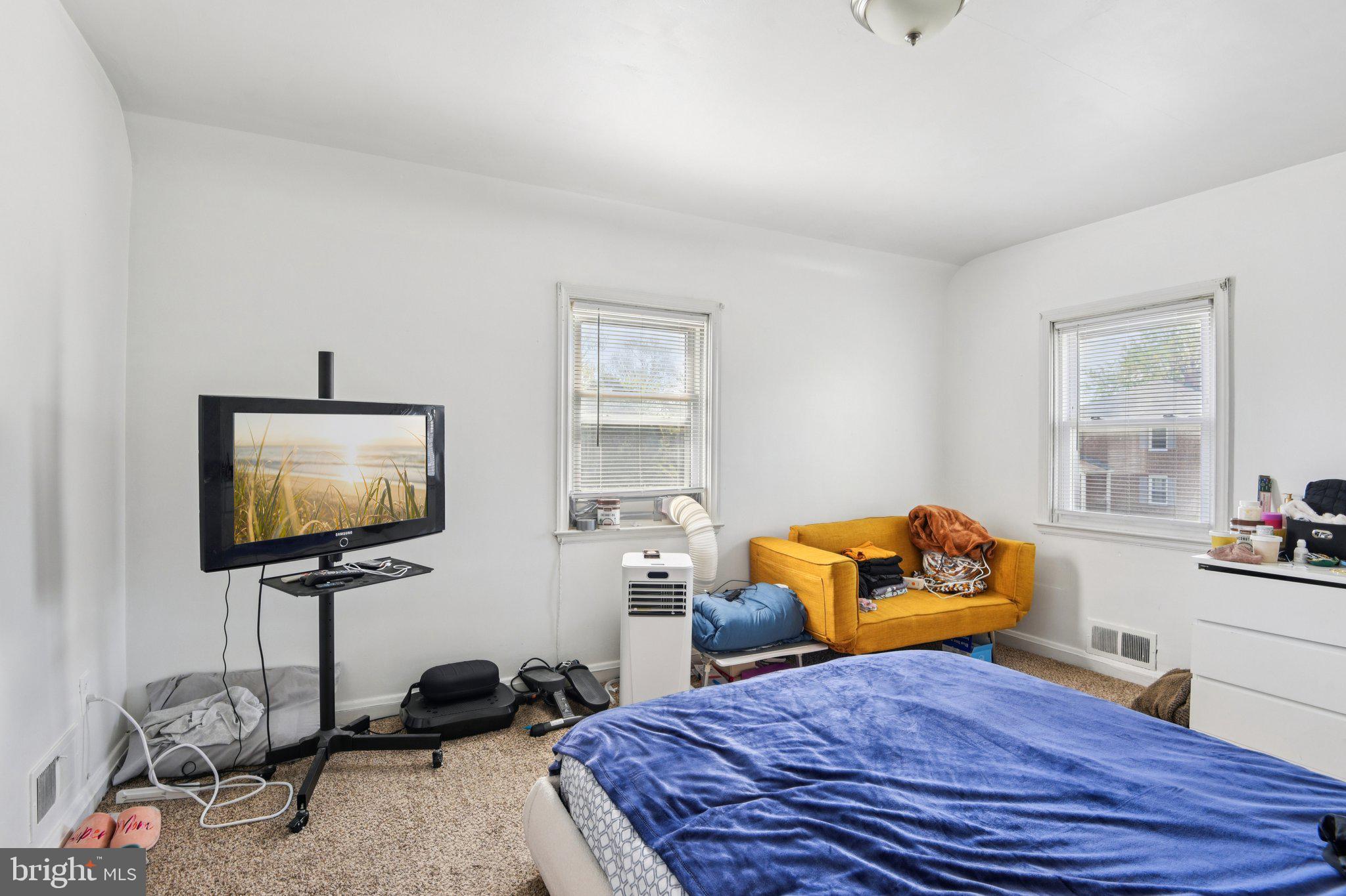 601 Braeside Road Baltimore, MD 21229 - Photo 14 of 24 Cozy bedroom with natural light.