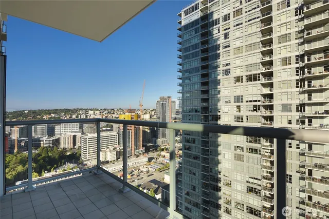 a view of a balcony with city view