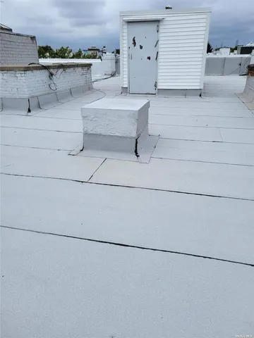 a bathroom with a sink a toilet and shower curtain