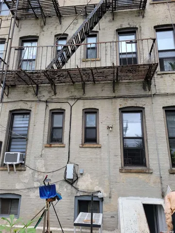a view of a street with cars