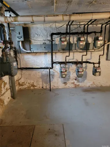 a view of a room with water heater and racks