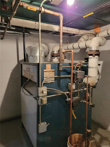 a kitchen with stainless steel appliances granite countertop a stove a sink dishwasher and a refrigerator