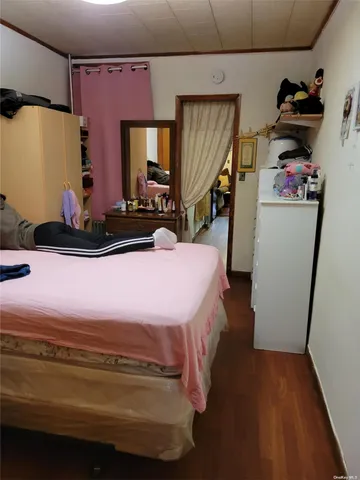 a room with a bed and furniture