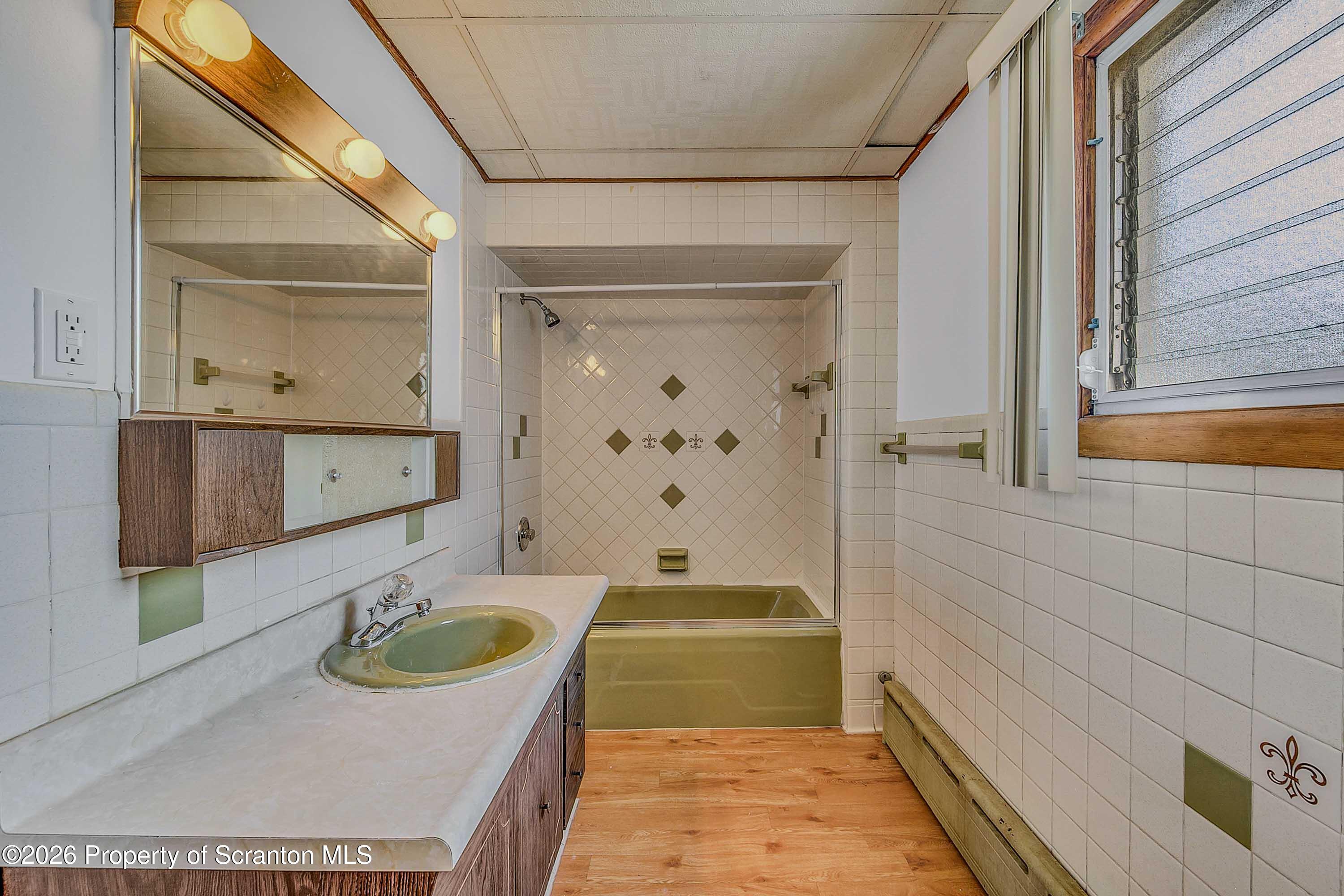 1425 Church Avenue Scranton, PA 18508 - Photo 12 of 21 a bathroom with a sink and a bathtub