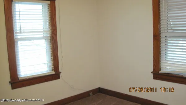a view of a livingroom with furniture
